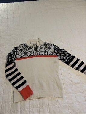 Cream Quarter-Zip Sweater with Black Pattern and Coral Trim